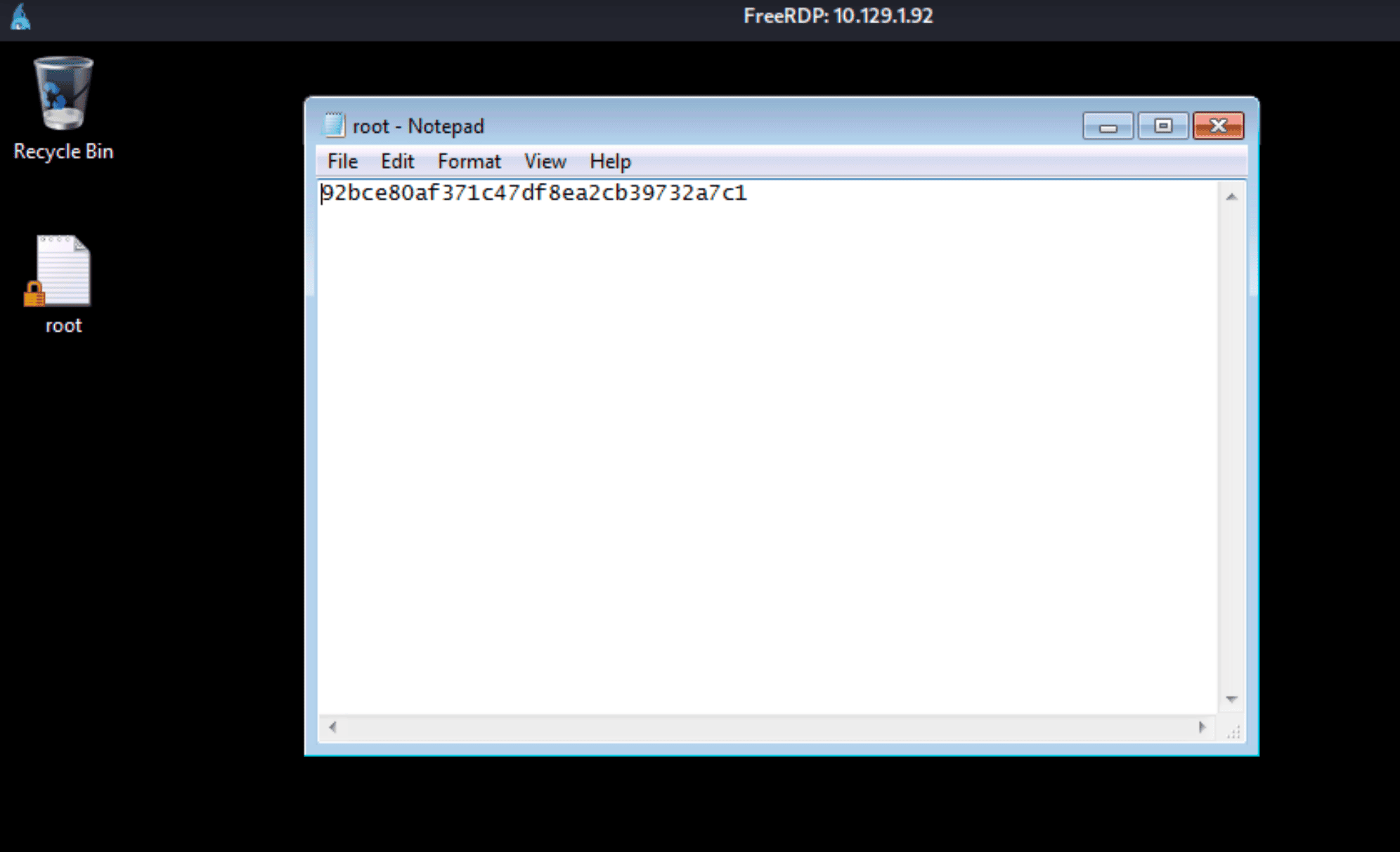 FreeRDP session showing root.txt flag open in Notepad on Administrator's desktop